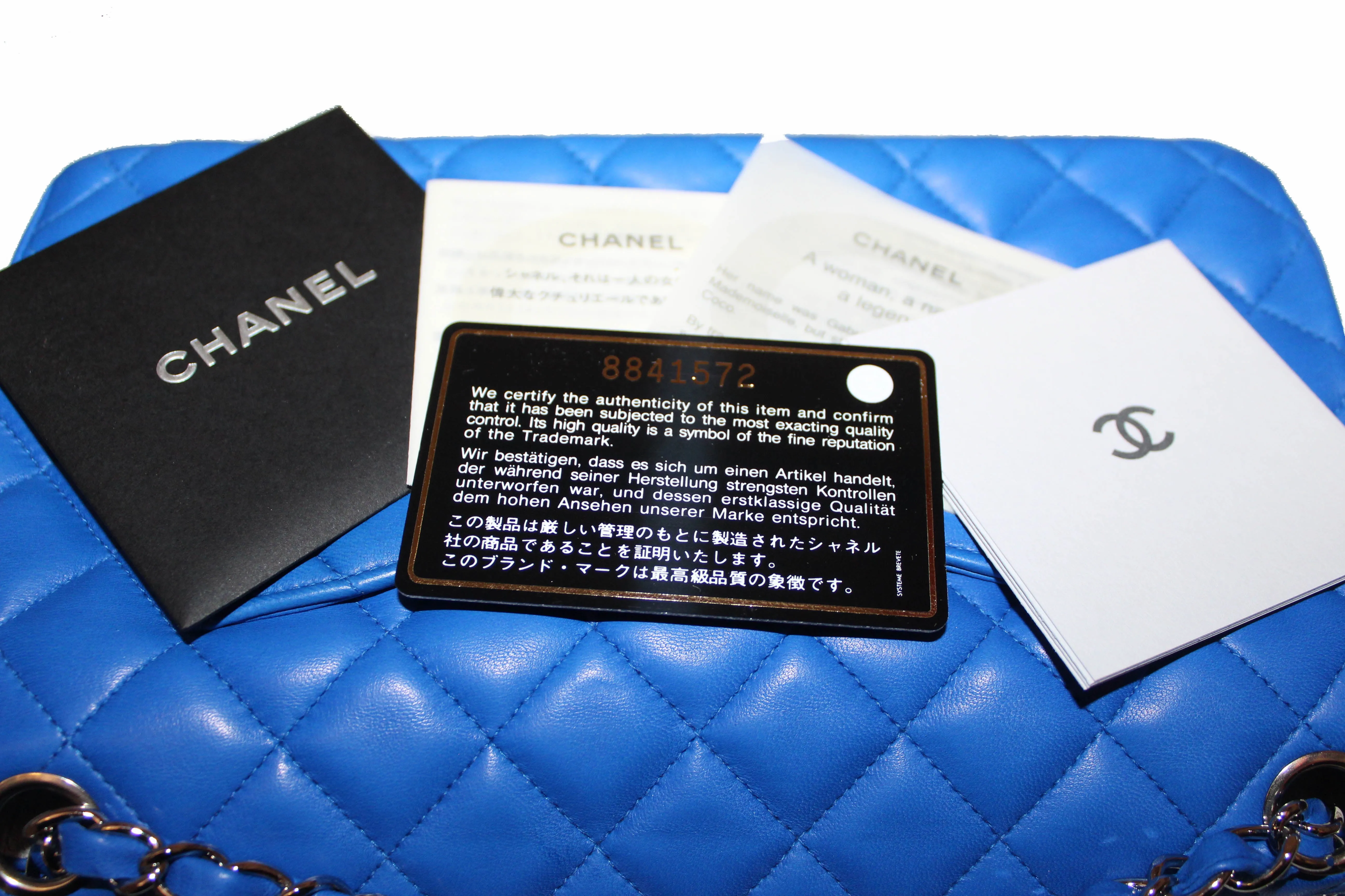 Authentic New Chanel Electric Blue Lambskin Quilted Leather Charrm Medium Classic Shoulder Bag