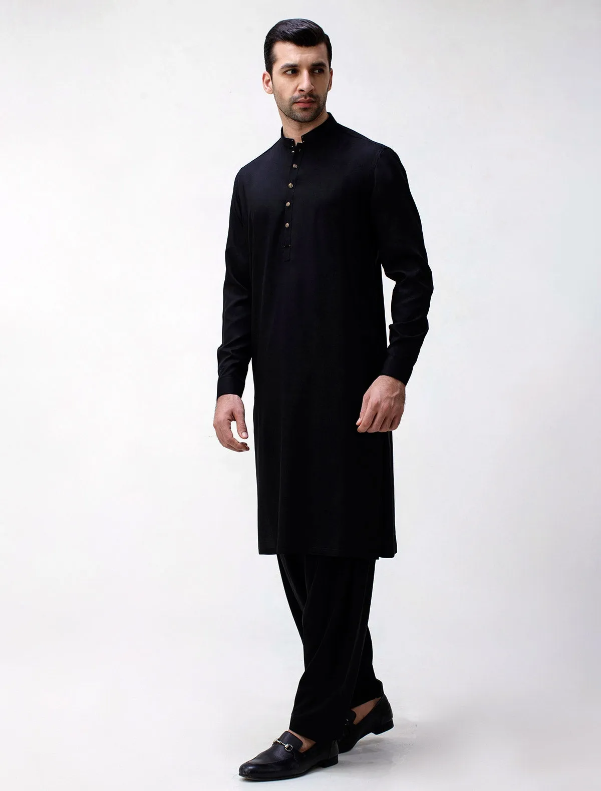 BLACK KAMEEZ SHALWAR WITH UNIQUE DETAILS