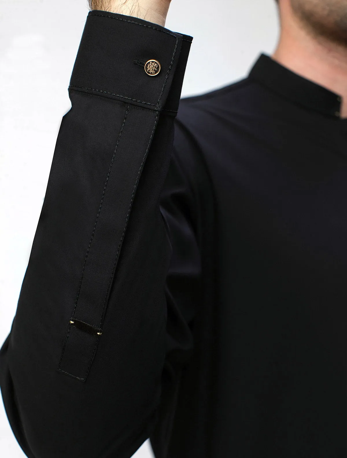 BLACK KAMEEZ SHALWAR WITH UNIQUE DETAILS