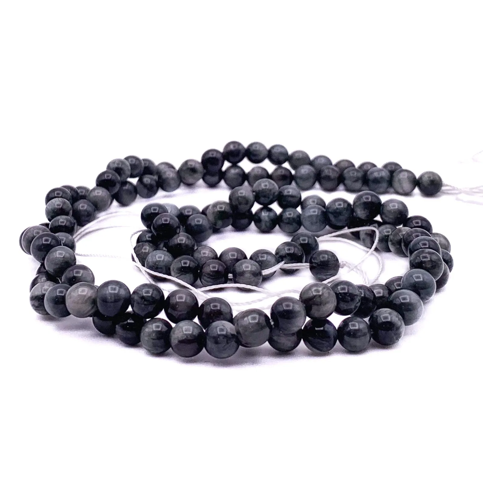 Eagle Eye 6.5mm Smooth Rounds Bead Strand