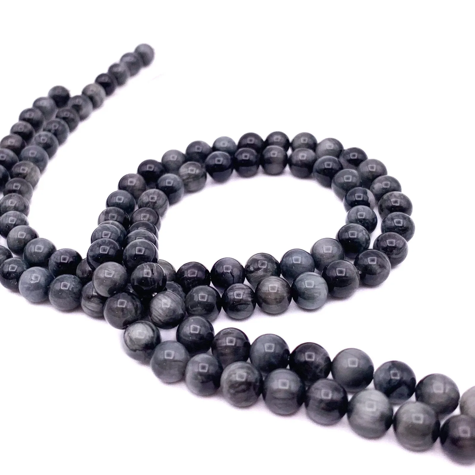 Eagle Eye 6.5mm Smooth Rounds Bead Strand