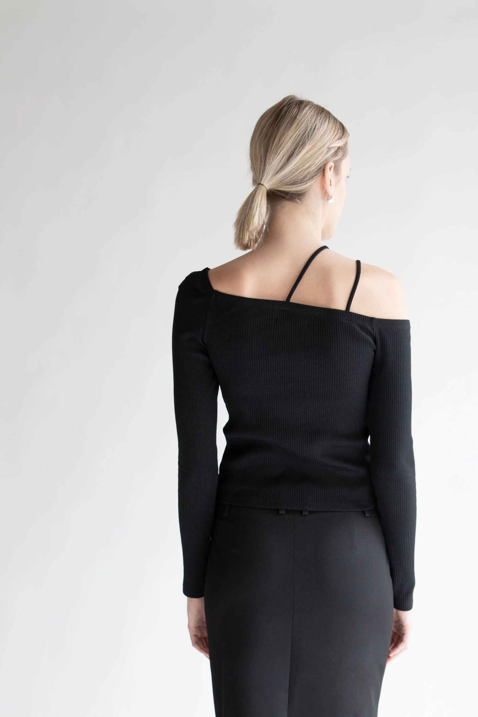 OFF SHOULDER TOP WITH STRAP DETAILS