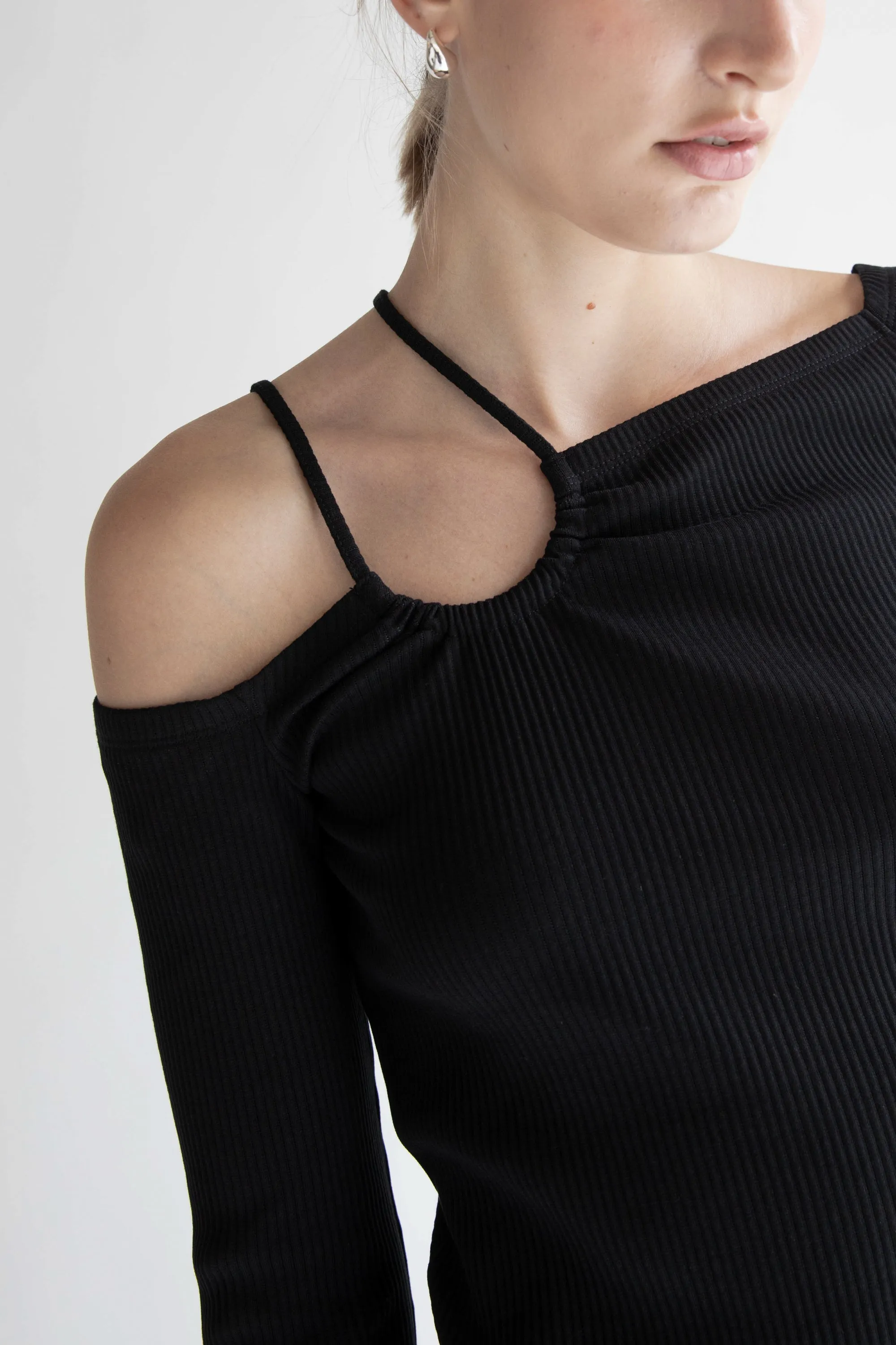 OFF SHOULDER TOP WITH STRAP DETAILS