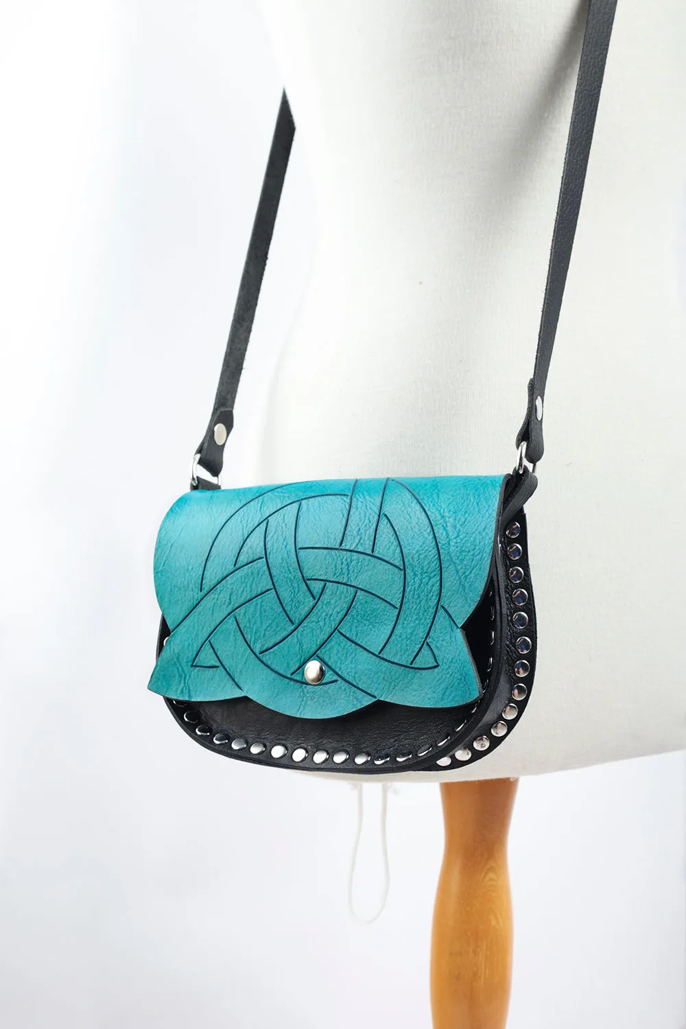 Trinity Knot on flap cross body bag
