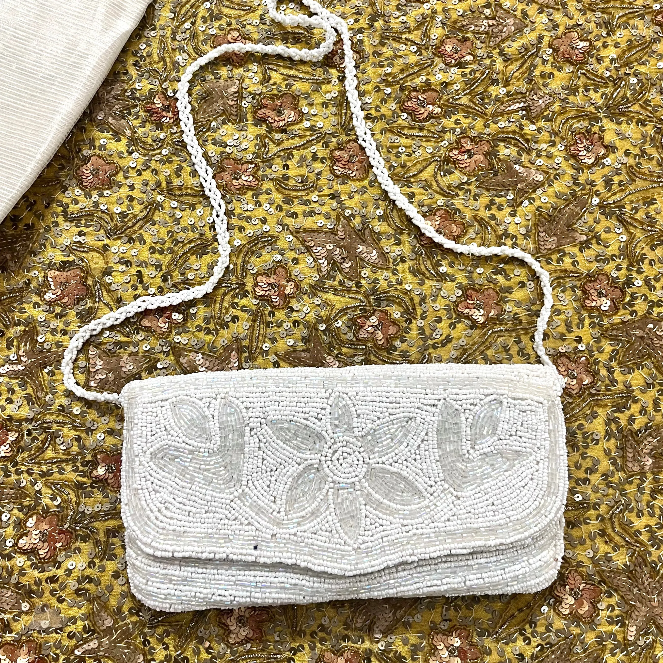 White pearl embellished purse